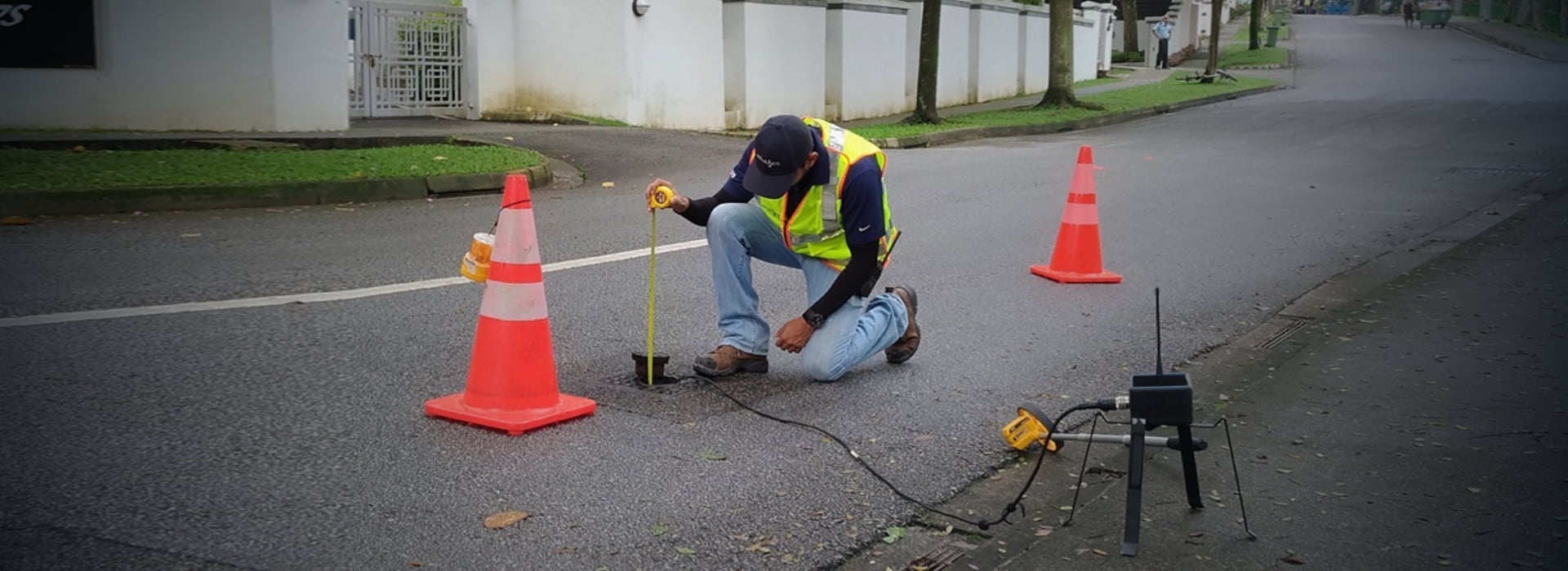 VODA.ai Condition Assessment, a man in a road check underground pipeline